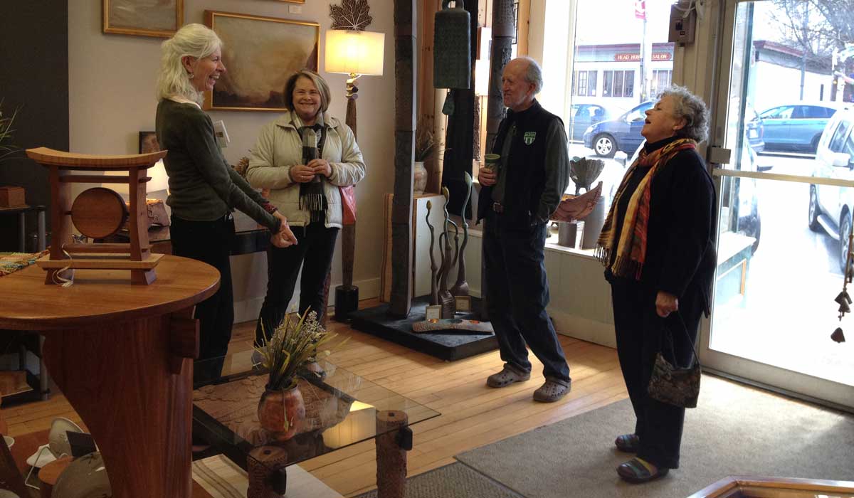 Guests gathered in the Exeter Fine Crafts gallery during a community event