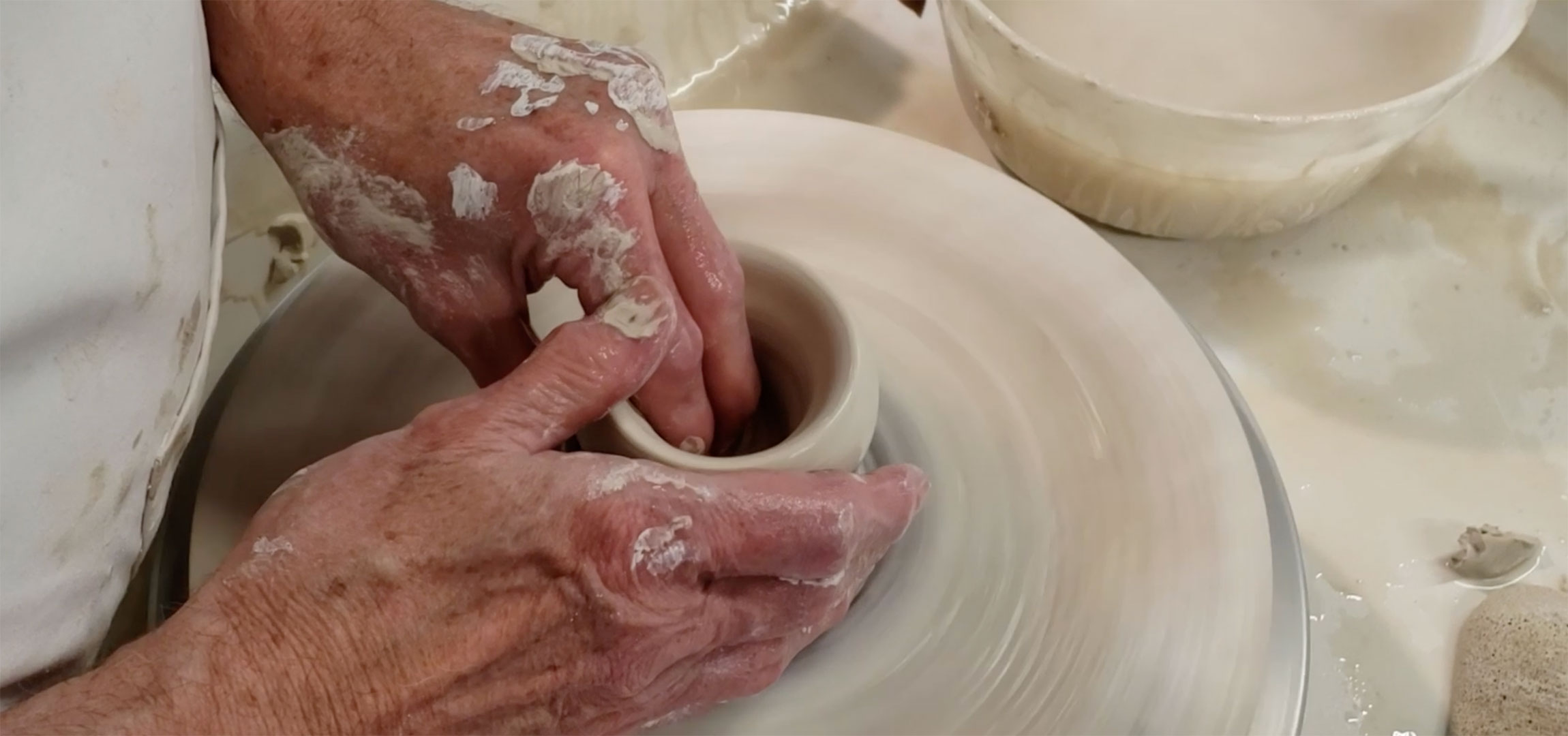Roger Cramer Throwing a Mug