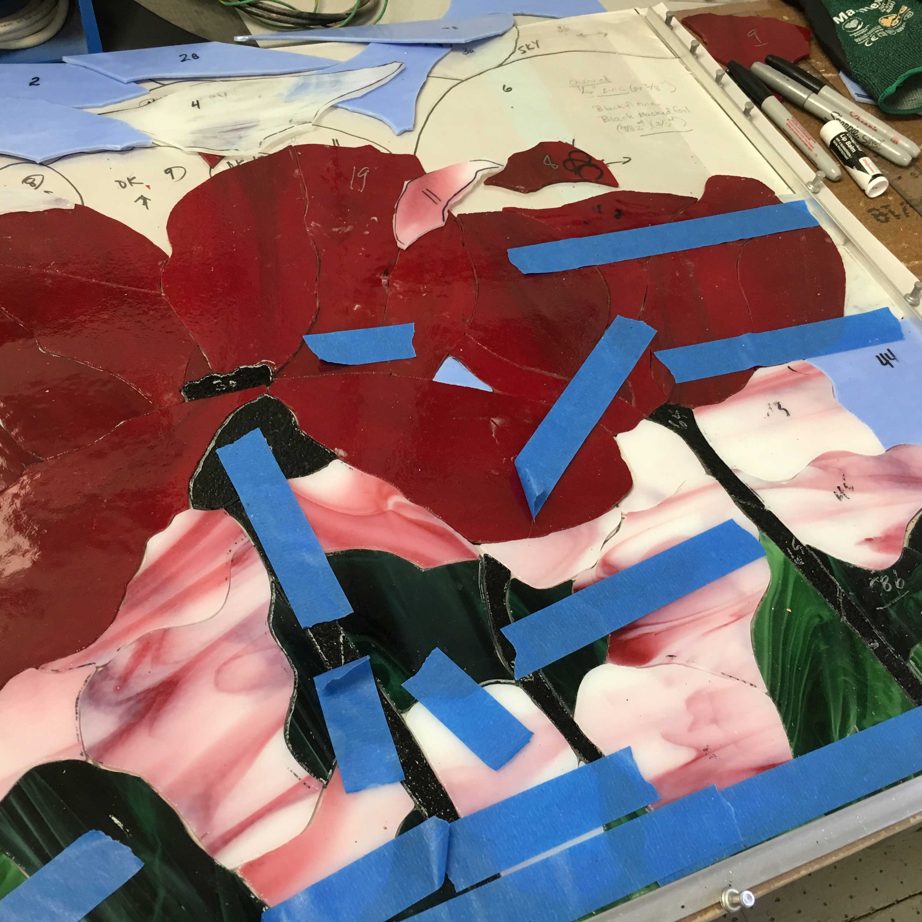 A red flower panel made in the stained glass class